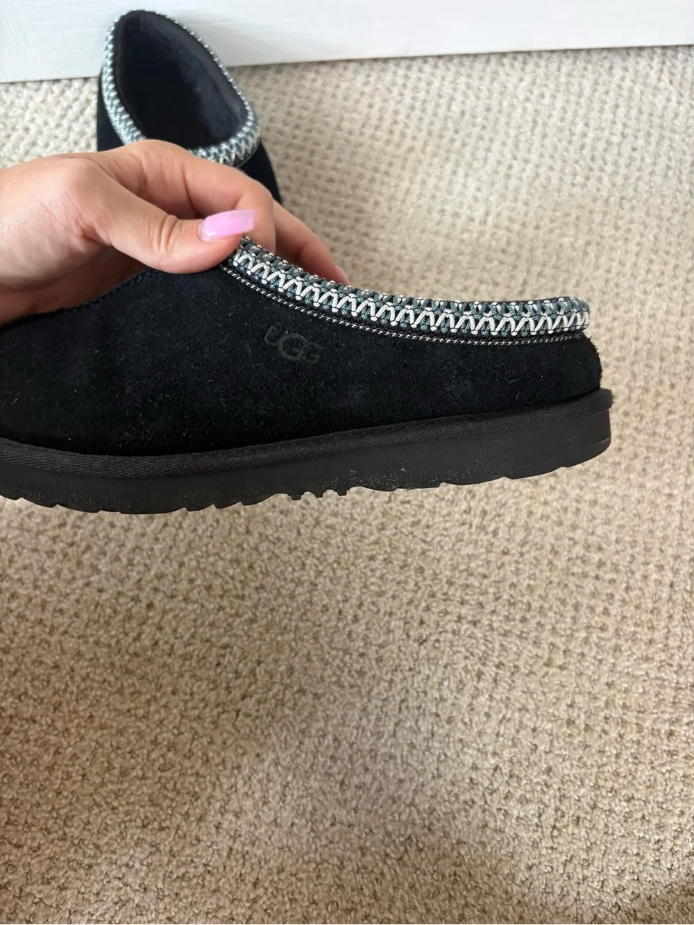 UGG Kids Black Slip-On Moccasin Slippers with Silver Trim